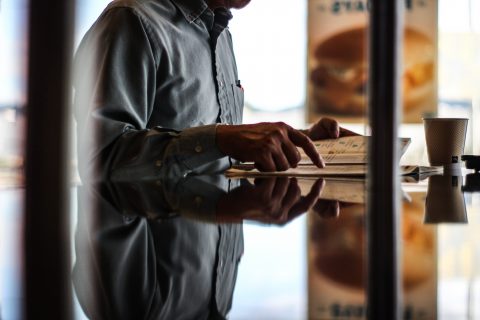 man reading book